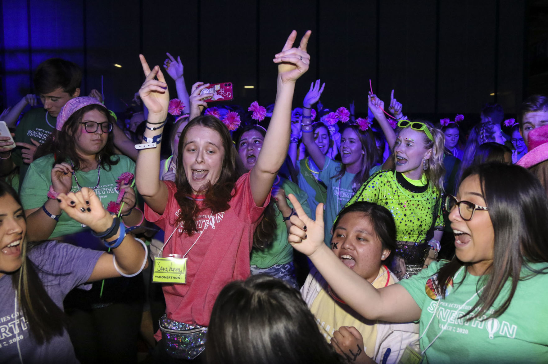 Students dance and sing